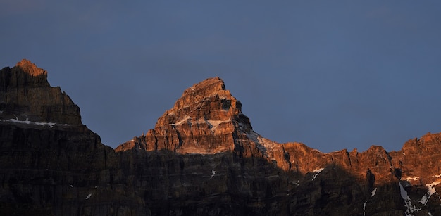 Rocky cliffs at sunrise in the Rockies of Canada