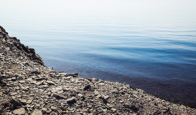 Rocky coast and calm blue sea