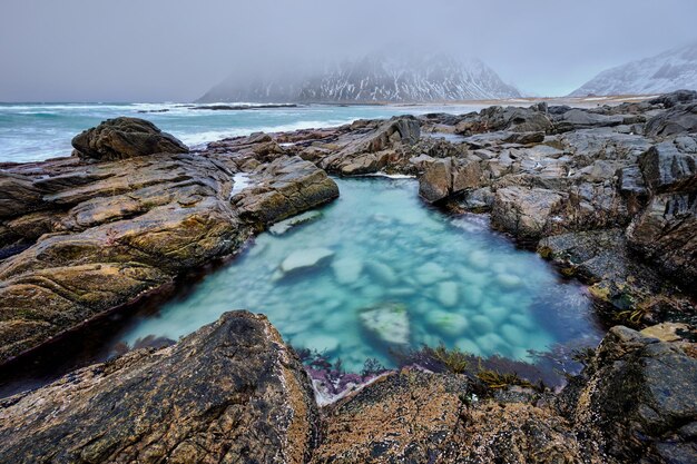 Rocky coast of fjord in Norway