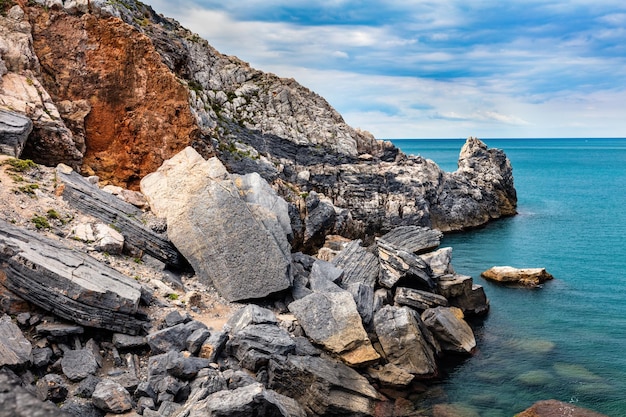 Rocky coast of Porto Venere Italy Cloudy dramatic sky