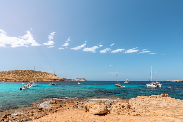 Rocky coast and the purest sea water on the Ibiza island, Spain