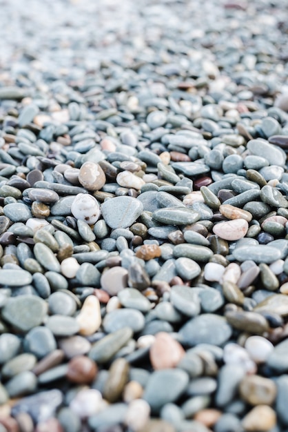 Photo rocky coast stones on the coast stones background sea stones