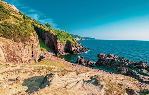 Rocky coastal area around Hammershus Ruins Castle in Bornholm, Denmark