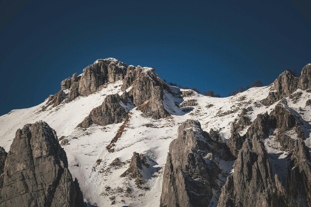 Rocky mountain under blue sky photo