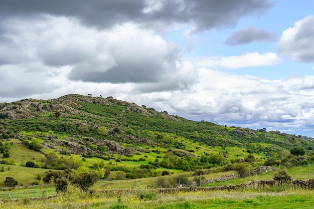 Rocky mountain with large clouds of an approaching storm Madrid