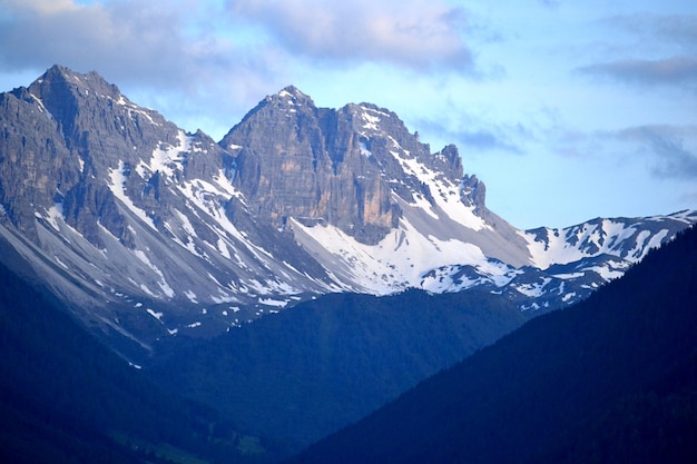 Rocky peak of the mountain covered with snow Alps in Austria