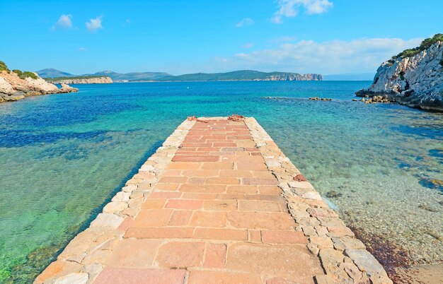 Rocky pier in Cala Dragunara Sardinia