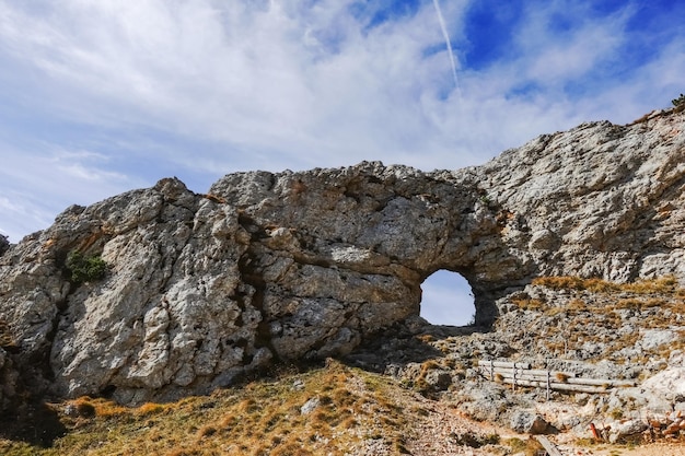 Rocky round passage on a hiking path during hiking in autumn