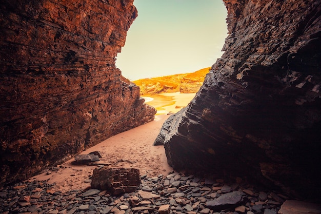 Rocky seashore Natural landscape Rocky grotto at low tide