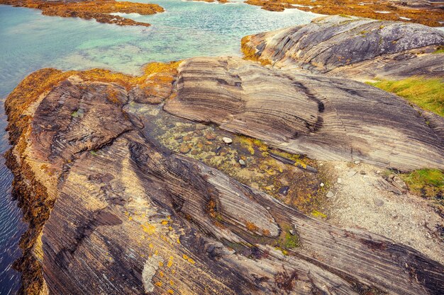 Rocky seashore Rocky texture stone coastline View of a fjord Norway Europe