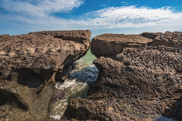 Rocky seashore and storm waves