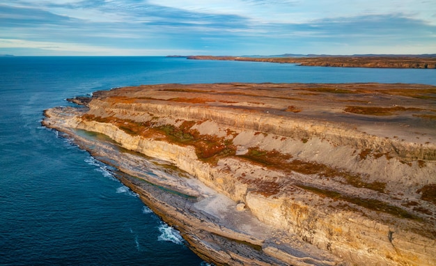 Rocky shore on east coast of atlantic ocean aerial nature background