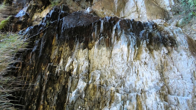 Rocky wall in dolomites with clearly visible details of the ripples