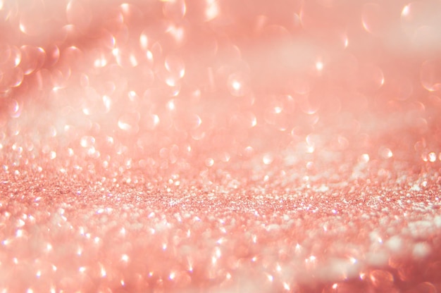 Rode bokeh-achtige glitterachtergrond