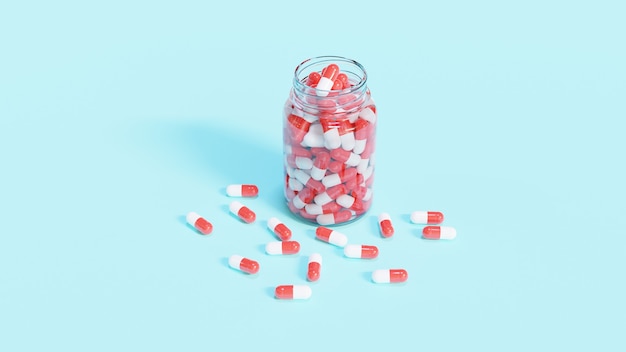 Rode en witte capsules met glazen fles