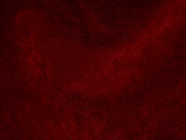 Rode fluwelen stof textuur gebruikt als achtergrond Lege rode stof achtergrond van zacht en glad textiel materiaal Er is ruimte voor tekst