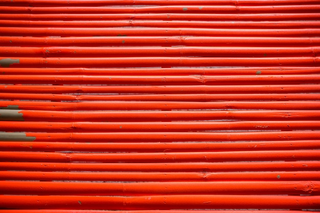 Rode houten patroonmuur voor abstracte achtergrond.