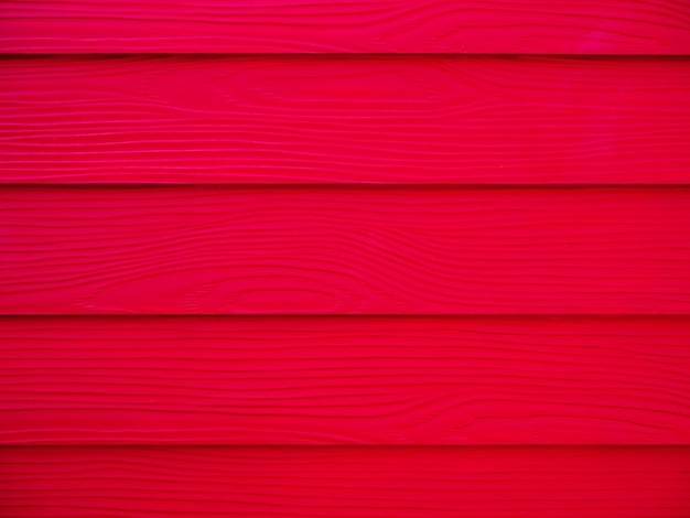 Rode houtstructuur muur achtergrond oppervlak met een horizontaal patroon Levendige rode houten tafelblad weergave
