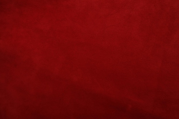 Rode lederen achtergrond met ruw oppervlak deze foto close-up vorm kruk