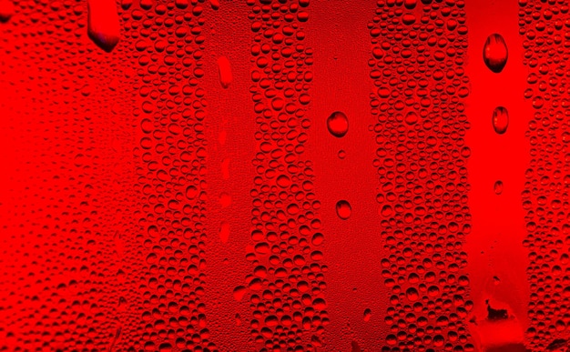 rode macro waterdruppel textuur Waterdruppels op rode achtergrond