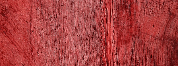 Rode murencary achtergrondbetonnen muur gepleisterd rode kras achtergrondgrunge textuur