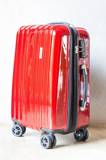 Foto rode reiskoffer voor extravert