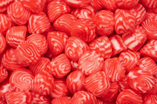 Rode ronde smakelijke gummy snoepjes als achtergrond