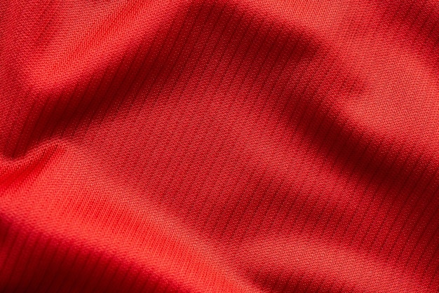 Rode sportkleding stof voetbal jersey textuur close-up