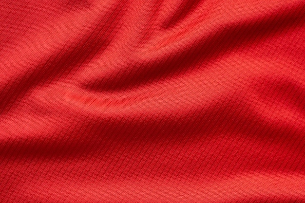 Rode sportkleding stof voetbal jersey textuur close-up