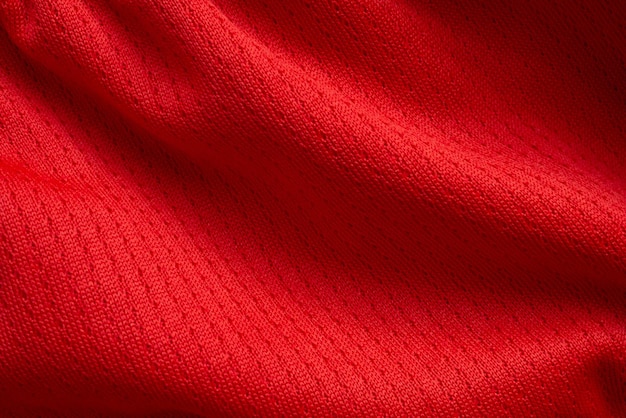 Rode sportkleding stof voetbal shirt trui textuur achtergrond