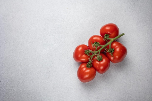 Rode tomaten op de achtergrond Close-up