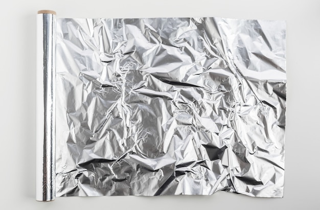 Roll of aluminum foil isolated on white 