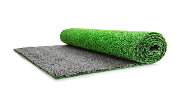 Photo roll of artificial grass mat on white background