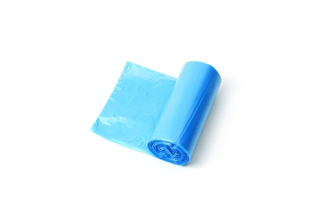 Roll of blue garbage bags isolated on white background