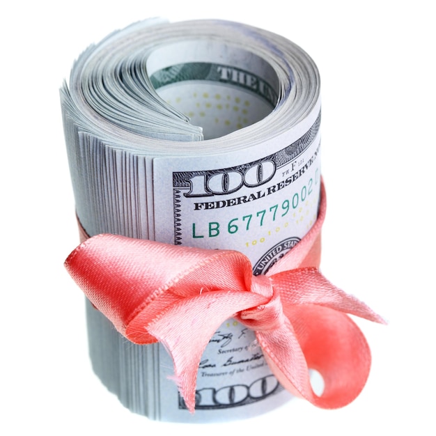 Roll of dollars bills with ribbon and bow