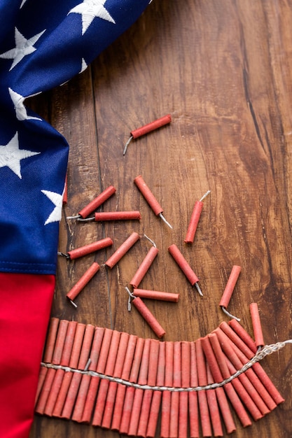 Roll of firecrackers with folded American flag.