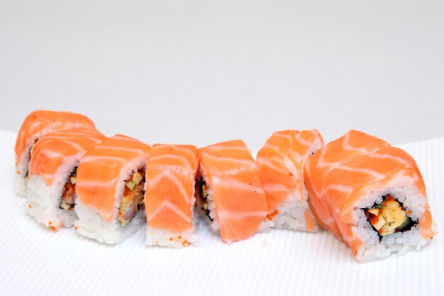 Roll Tokyo Sushi with salmon eel tender cheese Japanese food on a beautiful dish