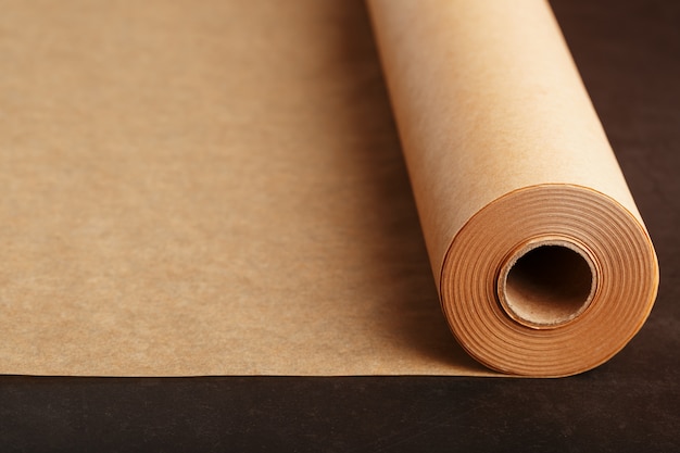 A roll of unfolded brown parchment paper