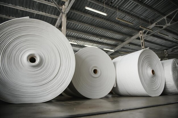 Roll of white fabric for cutting