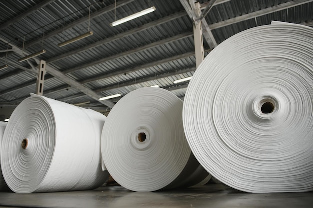 Roll of white fabric for cutting