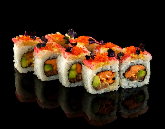 Roll with salmon teriyaki, surimi and avocado.