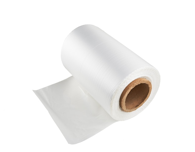 A roll of wrapping plastic film on a white background. Polypropylene or polyethylene rolls for packaging.