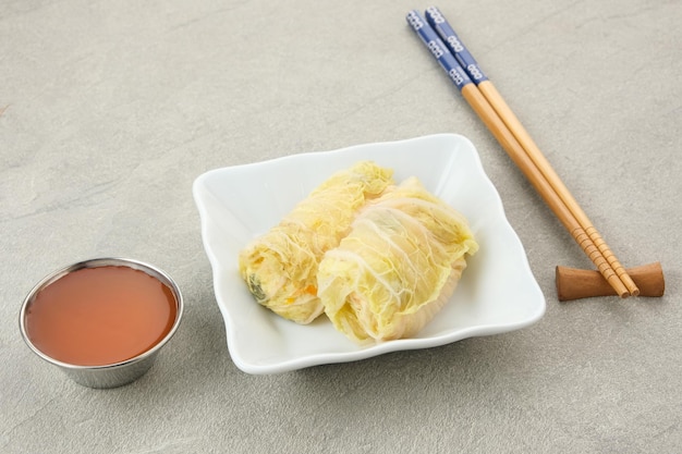 Rolled Chinese cabbage Sawi Gulung Tahu with tofu and chilli sauce