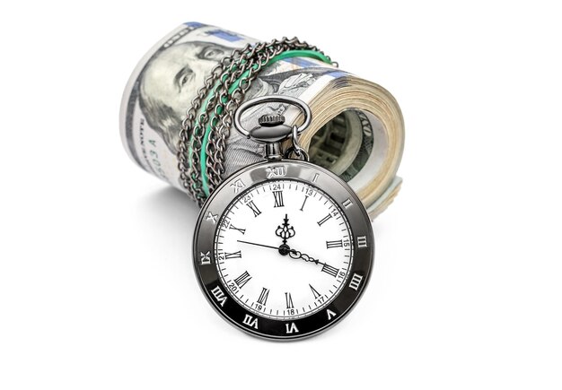 Rolled up dollar bills with pocket watch on white