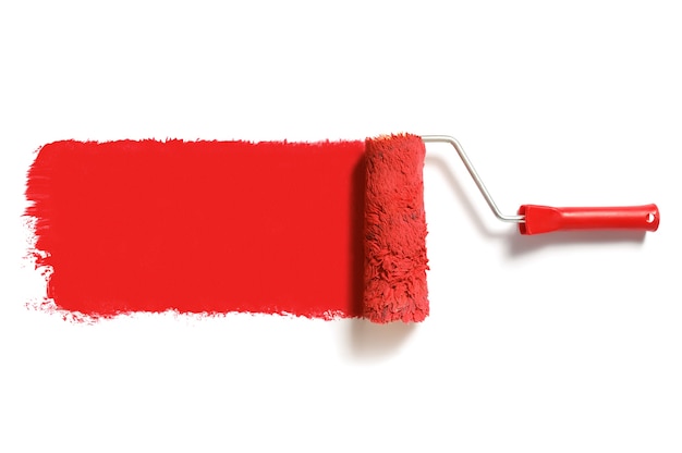 Photo roller brush with red paint isolated