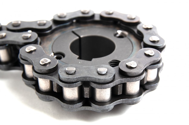 Roller chain and drive sprocket on white 