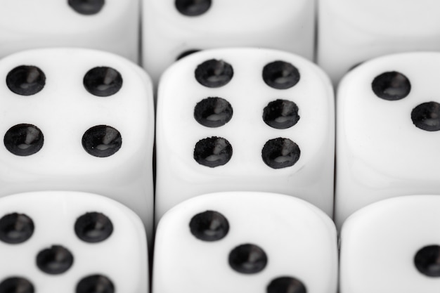 Rolling dice on a wooden desk