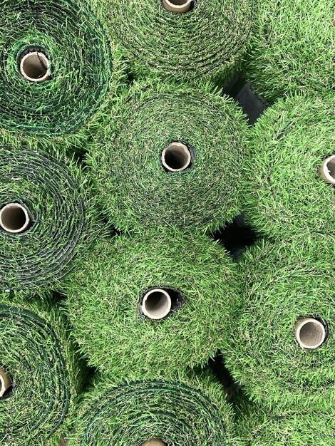 Rolls of artificial grass floor covering