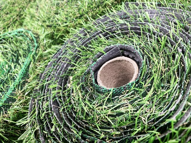 Rolls of artificial grass floor covering