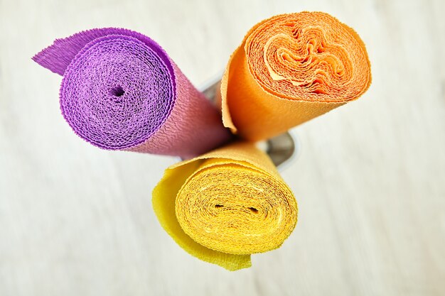 Rolls of multi-colored crinkle paper for creativity and craft.